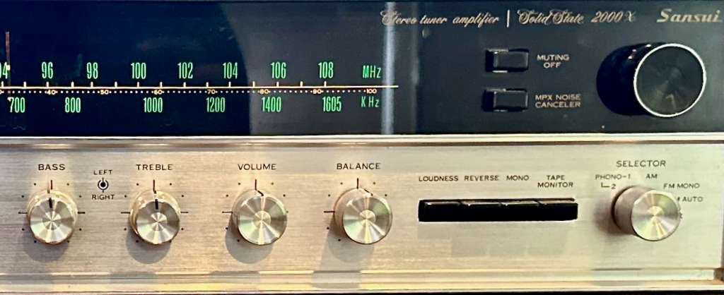 Sansui 2000X receiver front panel showing tone controls, volume, balance, and selector knobs