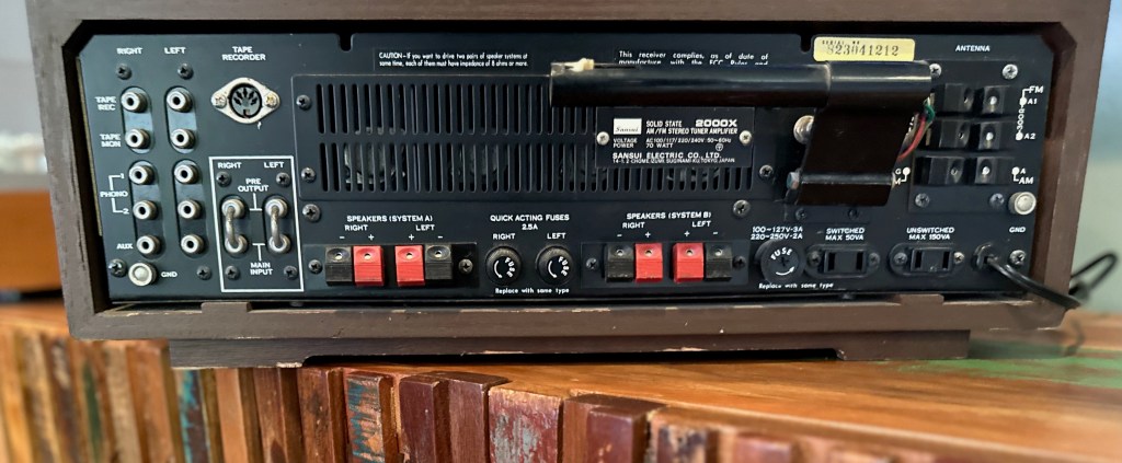Sansui 2000X rear panel with dual phono inputs, tape monitor loop, speaker outputs and RCA connections