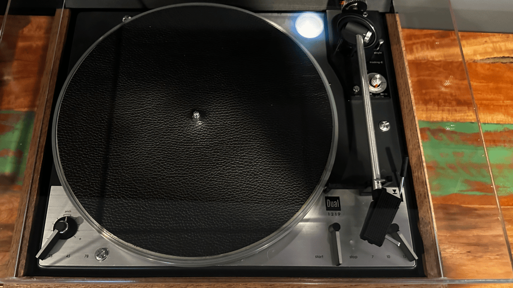 Restored Dual 1219 turntable with walnut plinth, clear dust cover and black leather platter mat