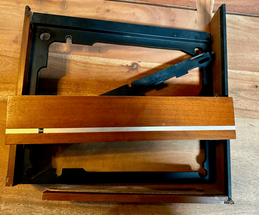 Original Dual 1219 wood plinth damaged during shipping with the turntable removed