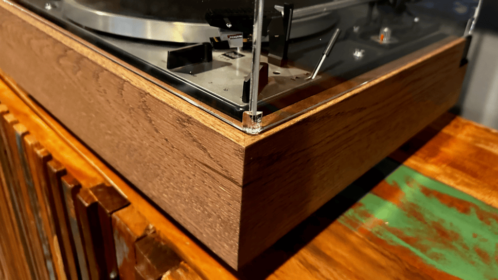 Dual 1219 turntable installed in a solid walnut replacement plinth